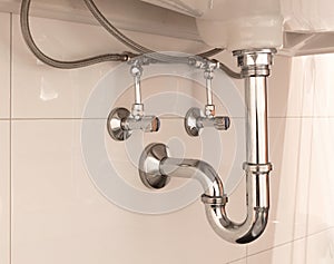 Basin siphon or sink drain in a bathroom