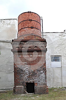 The basis of the dismantled factory chimney.