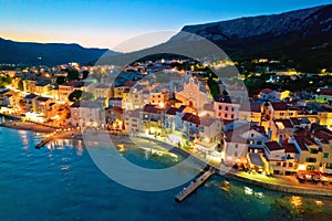 Baska. Aerial evening view of town of Baska waterfront