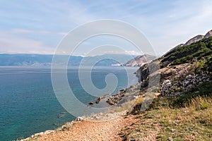 Baska - Idyllic hiking trail along rugged cliffs in coastal town Baska, Krk Island, Primorje-Gorski Kotar, Croatia, Europe