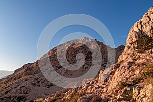 Baska - Panoramic view of steep mountains near coastal town Baska, Krk Otok, Primorje-Gorski Kotar, Croatia, Europe