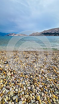 Baska - Paradise pebble beach in idyllic coastal town Baska, Krk Island, Primorje-Gorski Kotar, Croatia, Europe