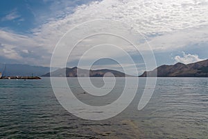 Baska - Scenic view of deserted island Prvic seen from beach in coastal town Baska, Krk Otok, Primorje-Gorski Kota