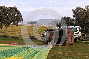 The basket of an aerostatic balloon lying on the ground