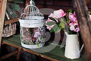 Basket with artificial flowers, beautiful Provence