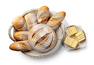 A basket with assorted breads: a large round loaf with a rustic,