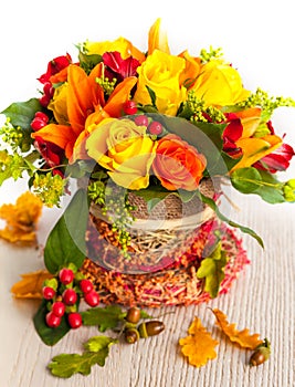 Basket of autumn flowers photo