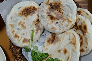 A basket of Baati roti for breakfast