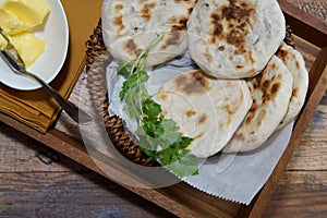 A basket of Baati roti for breakfast