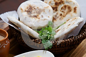 A basket of Baati roti for breakfast