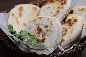 A basket of Baati roti for breakfast