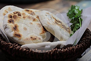 A basket of Baati roti for breakfast