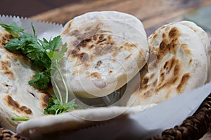 A basket of Baati roti for breakfast