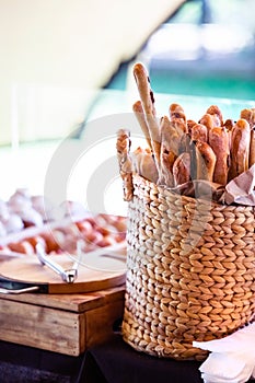 Basket with baguettes at a food stall