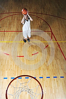 Basket ball game player at sport hall