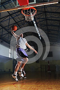 Basket ball game player at sport hall