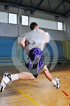 Basket ball game player at sport hall