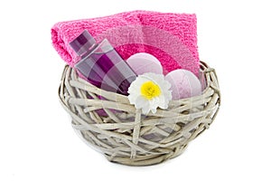 Basket with bath foam and bath bombs photo