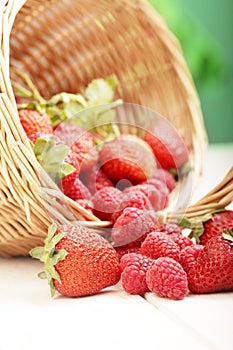 Basket with berry on table