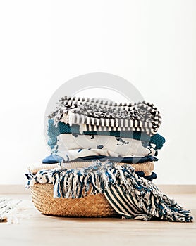 Basket with blue and beige laundry
