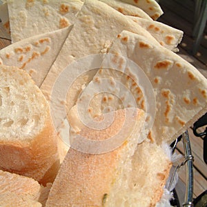 Basket with bread and piadina romagnola