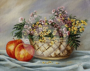Basket with buttercups and apples photo