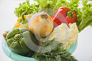 basket with cabbage and summer vegetables