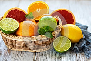 Basket with citrus fresh fruits