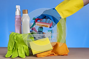 Basket with cleaning products for home hygiene use