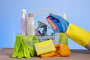 Basket with cleaning products for home hygiene use