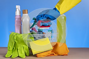 Basket with cleaning products for home hygiene use