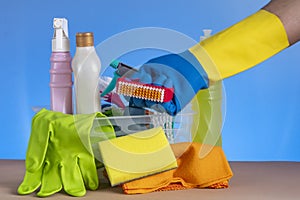 Basket with cleaning products for home hygiene use