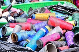 Basket of colored thread for flying kites