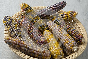 Basket with colorful gem glass corn on cob