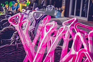 Basket with colorful plastic shovels at beach