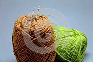A basket of crochet yarn,tassel and crochet hook