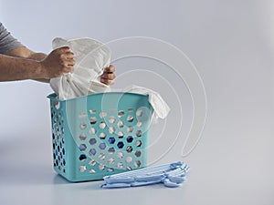 Basket with dirty clothes for washing