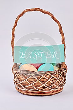 Basket, Easter eggs and card.