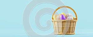 Basket with Easter eggs over blue