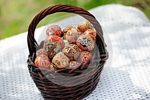 Basket of easter eggs on the table