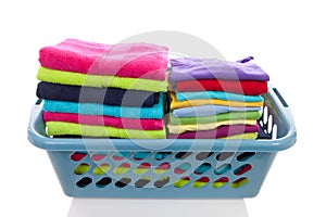 Basket filled with colorful folded laundry