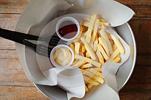 Basket of French Fries with tomato sauce
