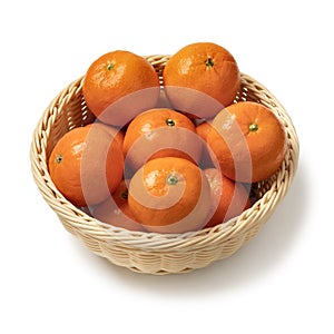 Basket with fresh ripe healthy Leanri mandarins on white background close up