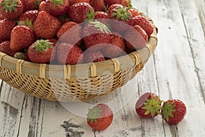 Basket with fresh ripe red strawberries