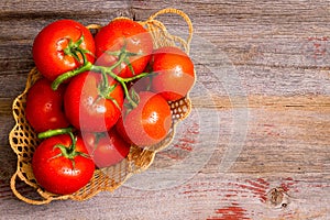 Basket of freshly ripened and cleaned tomatoes photo