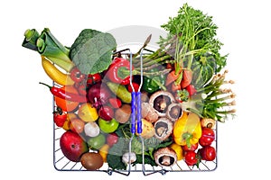 Basket fruit and vegetables isolated on white