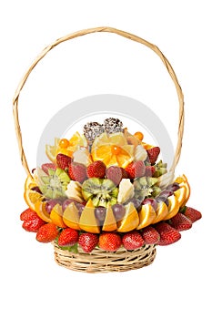 Basket with fruits and berries in chocolate isolated on white background. Handmade. Strawberries and grapes, citrus