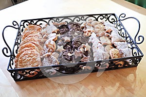 A basket full of Christmas cookies on a table