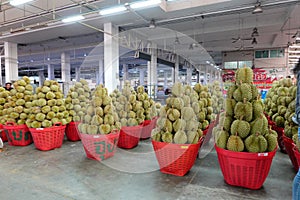 Basket full of durians at Talad Thai fruits market