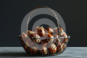 Basket Full of Fresh Hazelnuts on a Dark Wooden Background